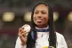 Bronze medalist Allyson Felix, of the United States, poses d