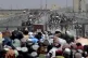 Stranded people crossing the border between Pakistan Afghani