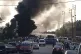 Black smoke rises from the scene where a fuel tanker explode