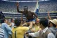 Pele is hoisted on the shoulders of his teammates after Braz
