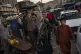 Taliban fighters patrol a market in Kabul's Old City, Afghan