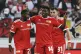 Union Berlin’s Taiwo Awoniyi (centre) and Sheraldo Becker 