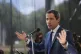 Opposition leader Juan Guaido speaks to the press in Caracas