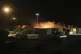 Smoke rises from a fire in a container storage area at the p