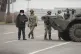 Kazakhstan troops and police block a street in Almaty, Kazak