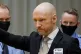 Norwegian mass killer Anders Behring Breivik arrives in cour