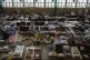 People who fled the war in Ukraine rest inside an indoor spo