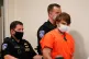 Payton Gendron is led into the courtroom for a hearing at Er