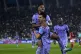 Real Madrid's Rodrygo, top, celebrates with teammates after 