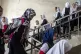 Girls attend school on the first day of the new school year,