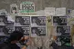 Activists paste photos of Roxana Ruiz that read in Spanish �