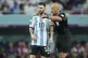 Referee Szymon Marciniak gestures as he speaks with Argentin
