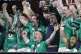 - Ireland's Johnny Sexton, bottom center, holds the trophy a