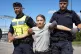 Climate activist Greta Thunberg is detained by police during