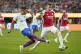 FC Barcelona forward Ferran Torres, left, scores past Arsena