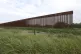 A border wall section stands on July 14, 2021, near La Grull