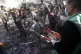 Palestinians evacuate a wounded man following an Israeli air