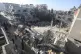 Palestinians look for survivors of the Israeli bombardment o