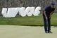 Phil Mickelson lines up a shot on the 18th hole during the f