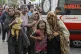 Injured Palestinians arrive at al-Shifa Hospital following I