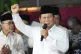 Indonesia's Defence Minister Prabowo Subianto raises his fis