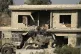 Israeli forces remove a body of a man killed during a milita