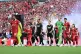 Liverpool's Mohamed Salah (left) leads his team onto the fie