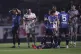 Juan Izquierdo of Uruguay's Nacional lies on the pitch after