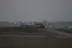 An Israeli tank overlooks the Gaza Strip, as seen from south