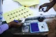 Election officials check identification papers of people who