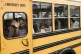 Nicaraguan citizens wave from a bus after being released fro