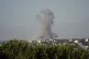 Smoke rises from an Israeli airstrike north of Beirut, in th