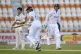 England's Zak Crawley (right) Joe Root (centre) run between 