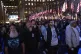 People watch an NBC News livestream showing poll results at 