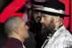 Boxer Tyson Fury, right, and Oleksandr Usyk, left, face off 