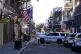 Emergency service vehicles form a security barrier to keep o