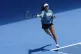 Britain's Emma Raducanu plays a forehand return to during a 