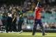 England's Sophie Dunkley, right, walks off after losing her 