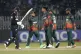 New Zealand's Devon Conway (left) walks off the field as Ban