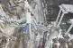 Elevated parts of a highway under construction is seen colla