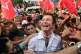 Opposition leader Salvador Nasralla is surrounded by support