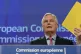 EU negotiator Michel Barnier wields a document 