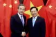 Chinese Foreign Minister Wang Yi (left) and Vietnamese Forei