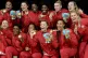 The England netball team celebrates with their gold medals a