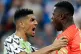 Nigeria's Leon Balogun, left, and Nigeria goalkeeper Francis