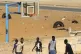Football and basketball games overlap as boys share space on