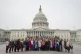 Democratic Party women members pose in front of Capitol Hill