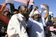 Supporters of Sudan’s President Omar al-Bashir attend a pr