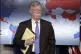 National security adviser John Bolton listens during a press