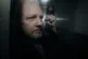 WikiLeaks founder Julian Assange puts his fist up as he is t
